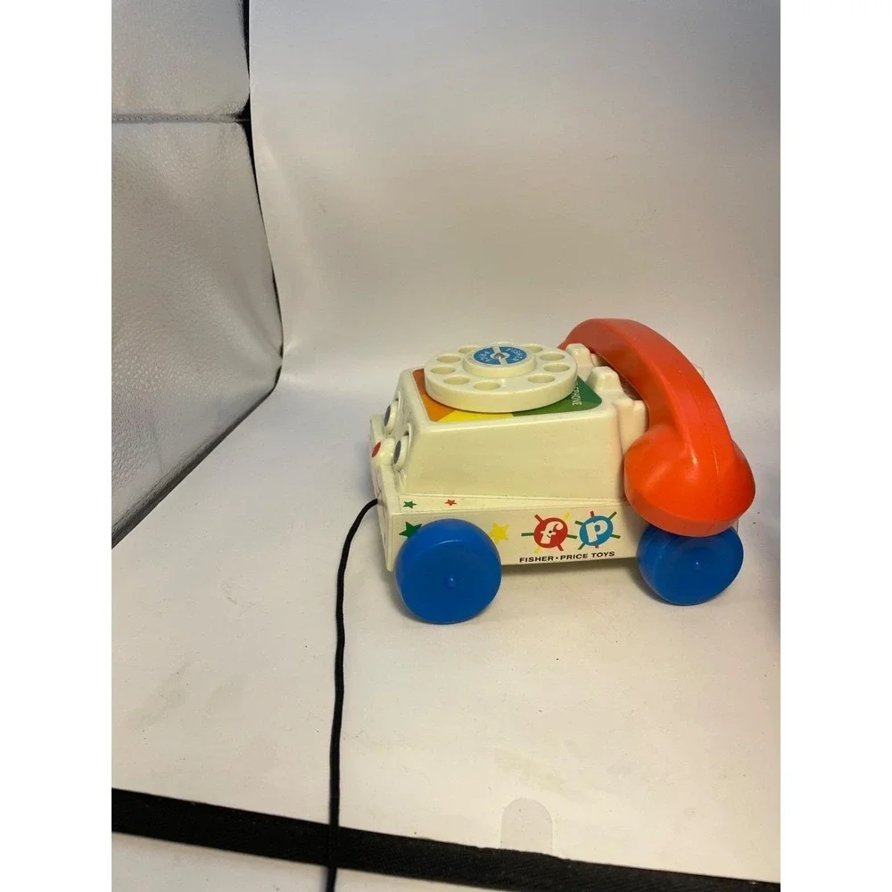 2009Fisher Price Chatter Telephone Toy Rotary Clicking Phone Moving Eyes Classic